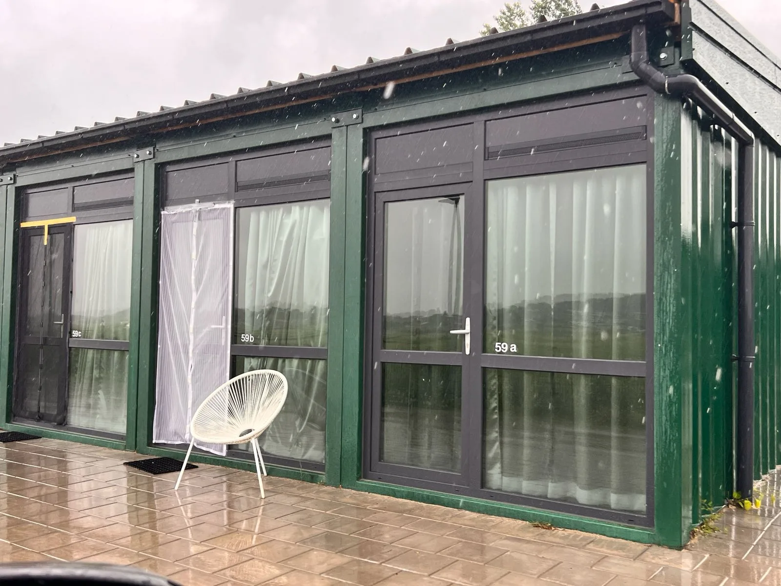 40FT container conversion — additional living area detail with modern furniture.