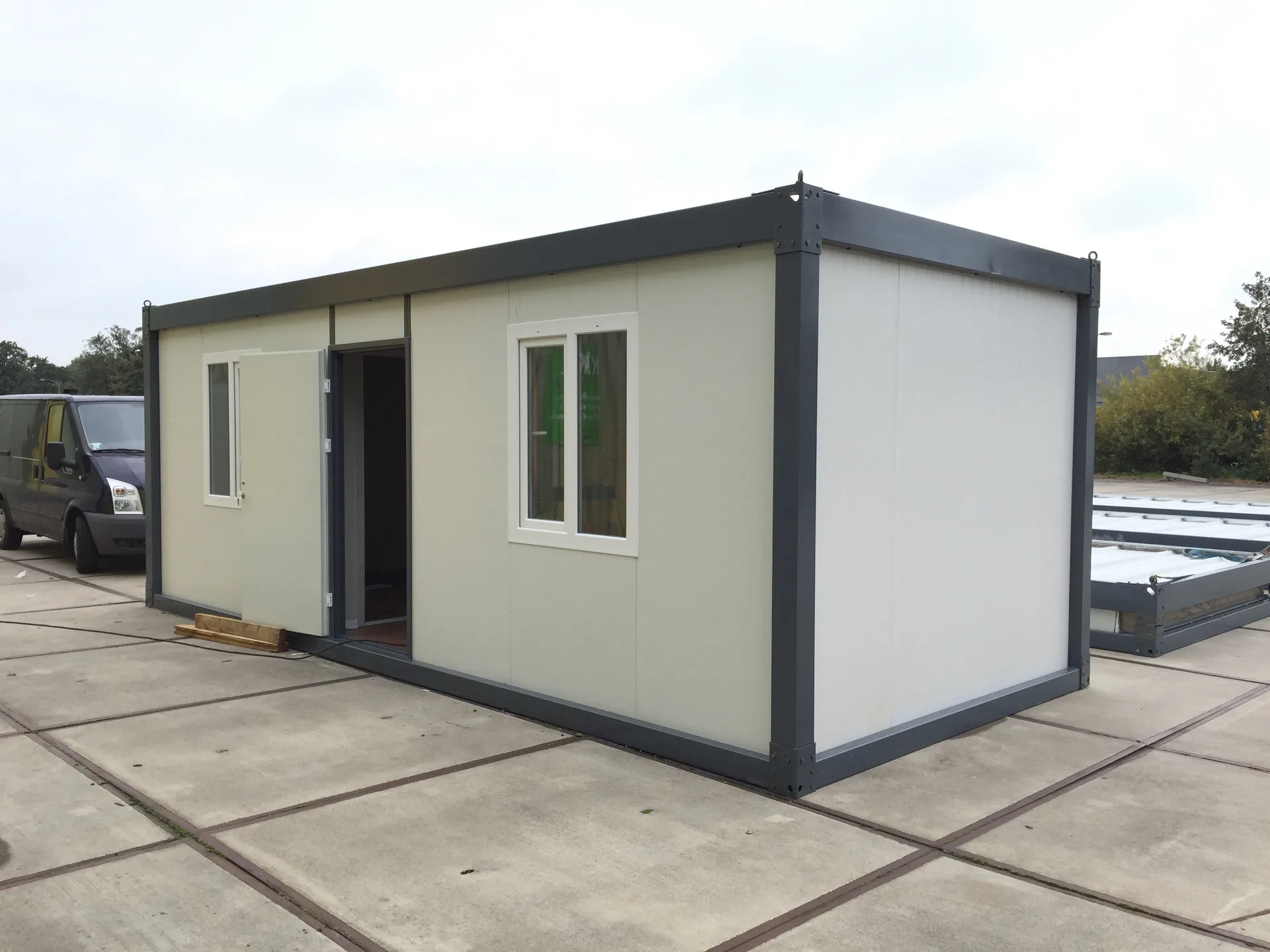 P3060 XL flatpack container — alternate exterior angle showing the long-side elevation and panel join detail.