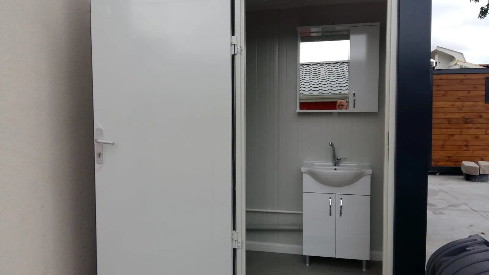 T210D large double WC — close-up of WC fittings and ventilation.