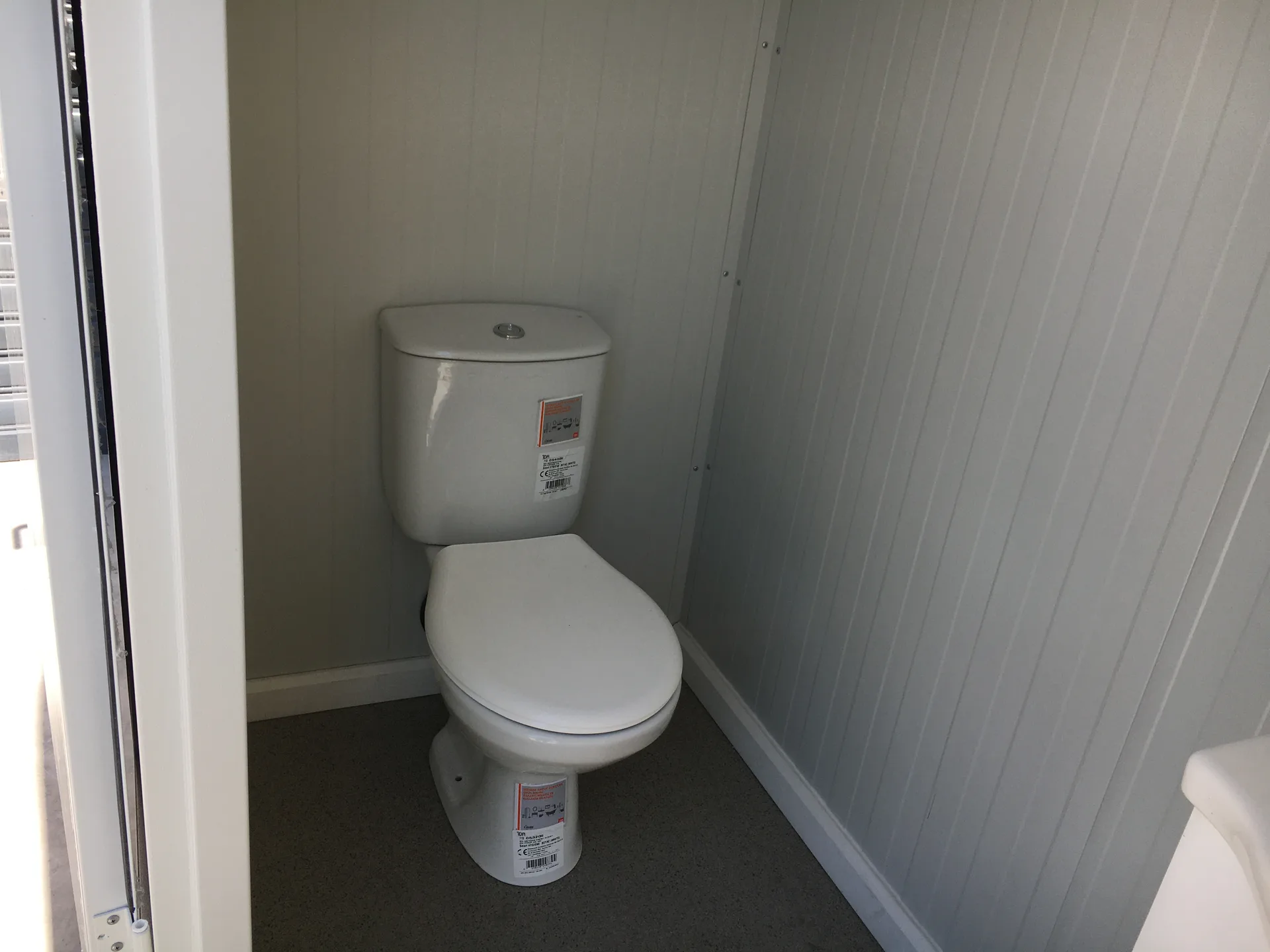 T210D large double WC — wider site context at an outdoor venue.