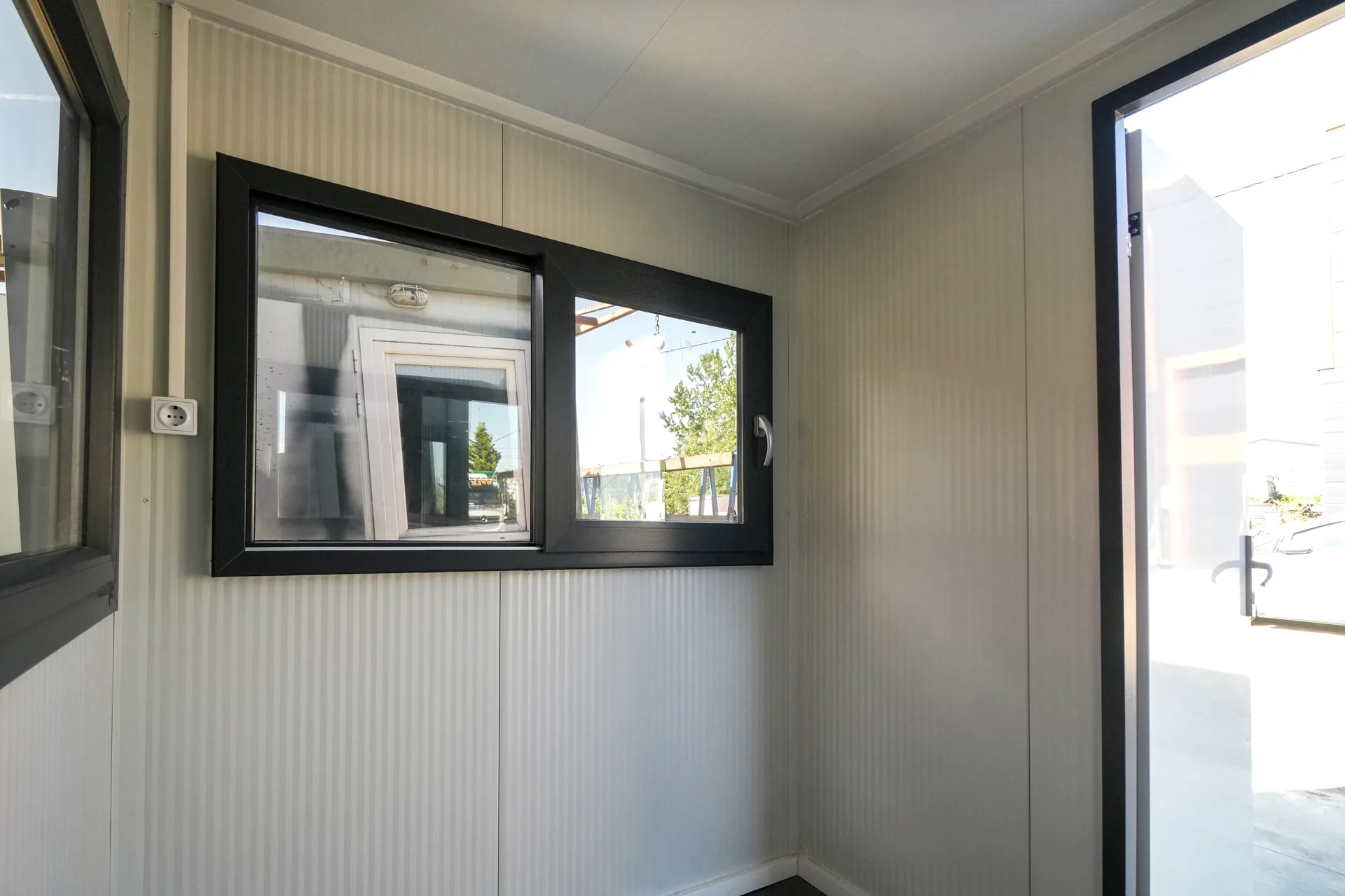 T200G L security hut — close-up of the observation window and locking door detail.