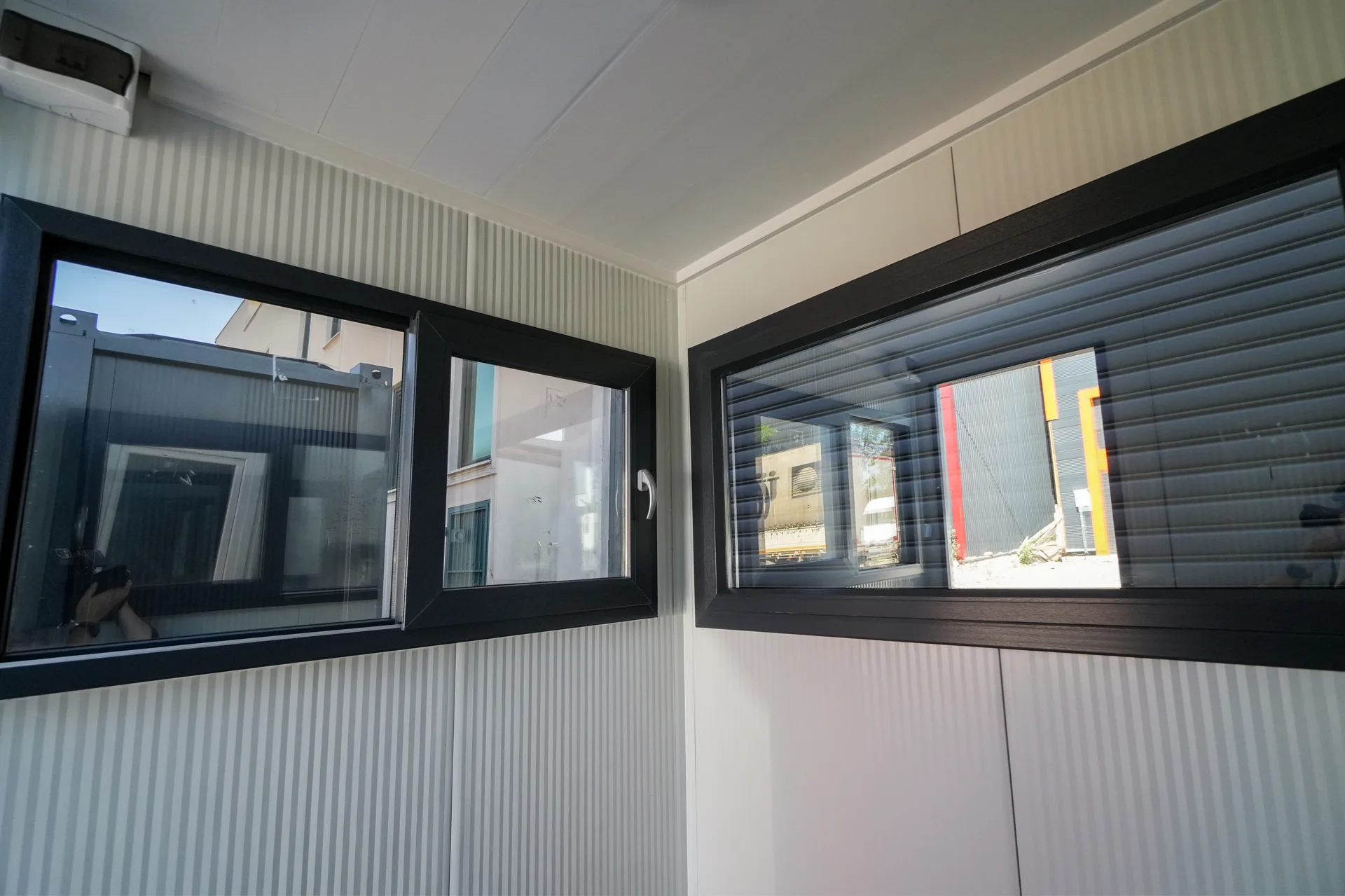 T200G L security hut — wider site context with adjacent perimeter infrastructure.